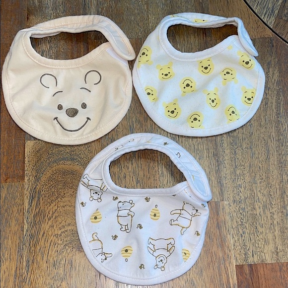 Adorable Cream and Yellow Winnie the Pooh Baby Bib Set - Picture 1 of 2